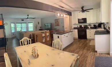 Welcome to this cute 2 bedroom bungalow nestled in the Blue - photo 4