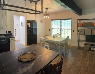 Welcome to this cute 2 bedroom bungalow nestled in the Blue - photo 5