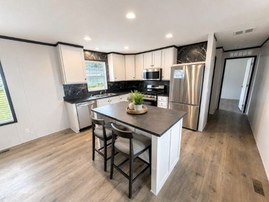 Welcome to this soon-to-be-complete 3 -bedroom 2 -bathroom home - photo 1