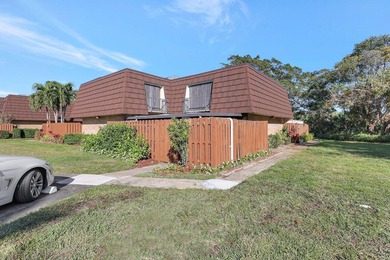 Welcome to this charming two-story townhouse nestled in the - photo 1
