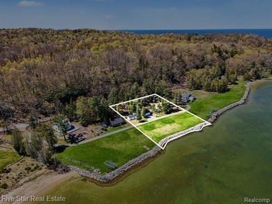 This rare opportunity to own 186 feet of private frontage on the - photo 2