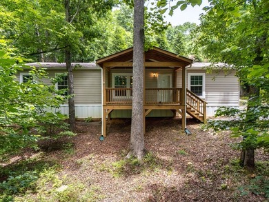 Enjoy easy country living nestled among the trees on 1.5 wooded - photo 2