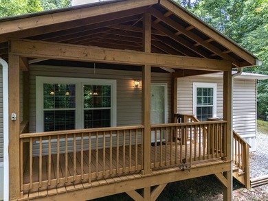 Enjoy easy country living nestled among the trees on 1.5 wooded - photo 3
