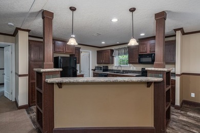 Enjoy easy country living nestled among the trees on 1.5 wooded - photo 7