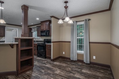 Enjoy easy country living nestled among the trees on 1.5 wooded - photo 9