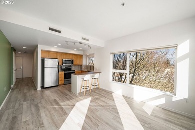 Bright corner condo with sweeping territorial and city views -