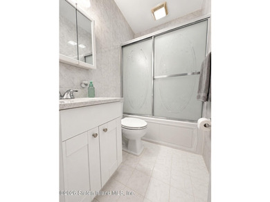 Updated 1-bedroom, 1-bath home featuring a modern kitchen, wood - photo 11