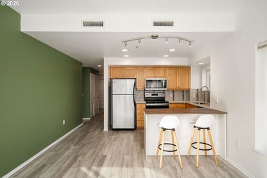 Bright corner condo with sweeping territorial and city views -