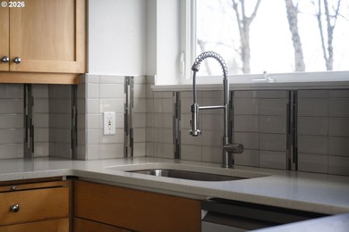 Bright corner condo with sweeping territorial and city views -