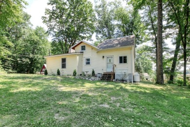 Lake Home Sale Pending in White Cloud, Michigan