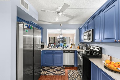 Enjoy serene golf course living in this spectacular second-floor - photo 15