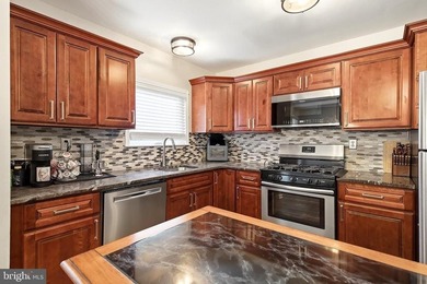 Experience worry-free living, in this meticulously renovated - photo 16