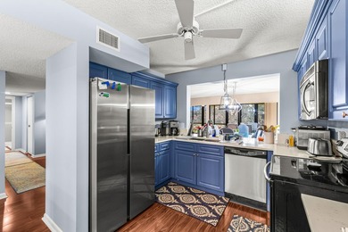 Enjoy serene golf course living in this spectacular second-floor - photo 16