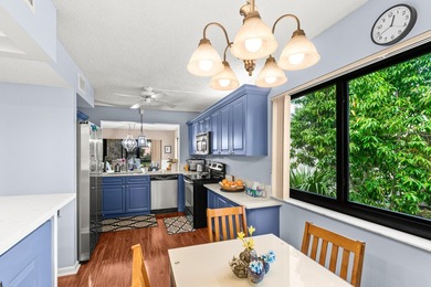 Enjoy serene golf course living in this spectacular second-floor - photo 17