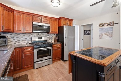 Experience worry-free living, in this meticulously renovated - photo 18