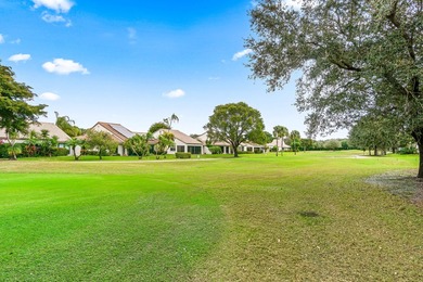 Enjoy serene golf course living in this spectacular second-floor - photo 32