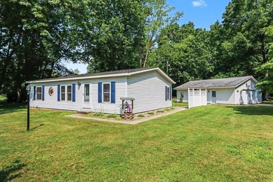 Move-in ready peace and tranquility await you! Situated on a - photo 2