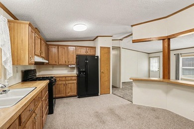 Move-in ready peace and tranquility await you! Situated on a - photo 6