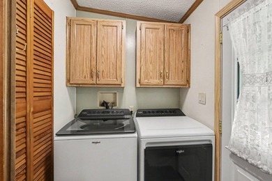 Move-in ready peace and tranquility await you! Situated on a - photo 7