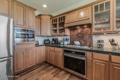 Tucked into the trees in one of Sandpoint's most sought-after - photo 14