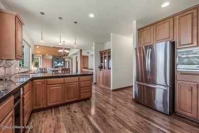 Tucked into the trees in one of Sandpoint's most sought-after - photo 15