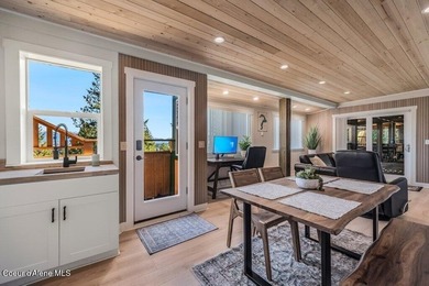 Tucked into the trees in one of Sandpoint's most sought-after - photo 19