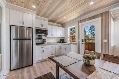 Tucked into the trees in one of Sandpoint's most sought-after - photo 20