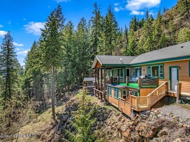 Tucked into the trees in one of Sandpoint's most sought-after - photo 38