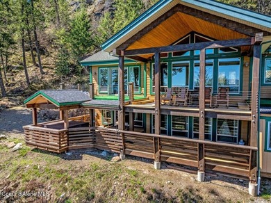 Tucked into the trees in one of Sandpoint's most sought-after - photo 40