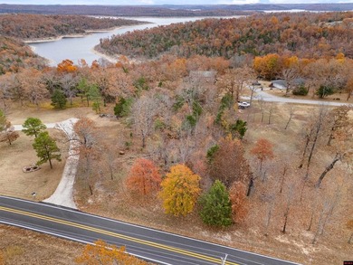 Take in the beauty of the Ozarks with this .65 acre m/l wooded - photo 3