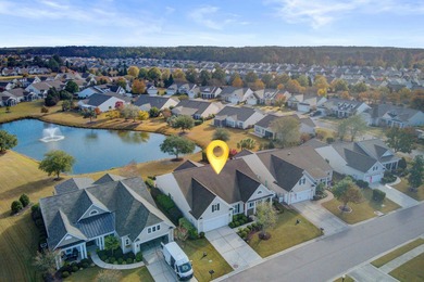 Pond living in this spacious, turn-key home in Del Webb Cane Bay