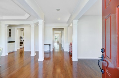 Pond living in this spacious, turn-key home in Del Webb Cane Bay