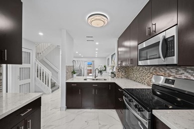 Experience waterfront living in this beautifully updated - photo 1