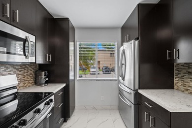 Experience waterfront living in this beautifully updated - photo 6