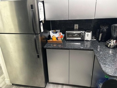 FIRST-FLOOR CORNER UNIT! Bright 2-bedroom, 1-bath on the first - photo 15