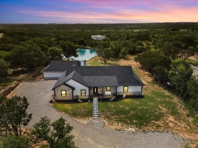 Lake Home For Sale in Santo, Texas