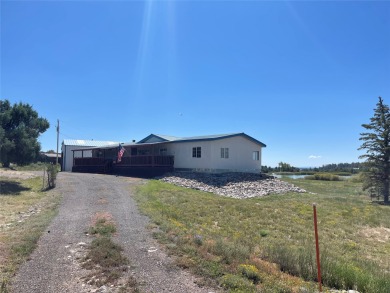 Lake Home Off Market in Los Ojos, New Mexico