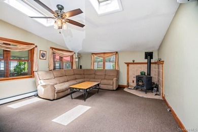 Set on a level, fully fenced property in East Islip, this 3 - photo 17