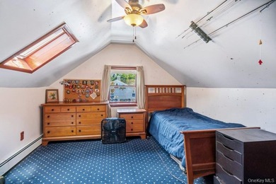 Set on a level, fully fenced property in East Islip, this 3 - photo 23