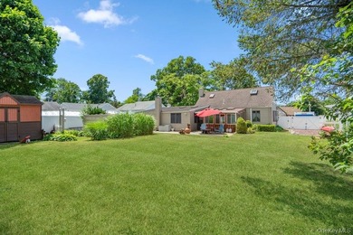 Set on a level, fully fenced property in East Islip, this 3 - photo 28