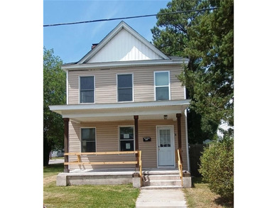 Discover this charming three-bedroom, two-bath Traditional home - photo 1