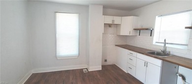 Discover this charming three-bedroom, two-bath Traditional home - photo 4