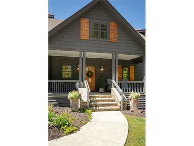 Discover refined mountain living in the heart of Chinquapin, a - photo 12