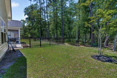 Experience refined Lowcountry living in Wedgefield Plantation at - photo 35