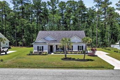 Experience refined Lowcountry living in Wedgefield Plantation at - photo 36