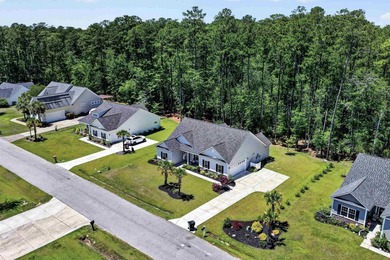 Experience refined Lowcountry living in Wedgefield Plantation at - photo 38