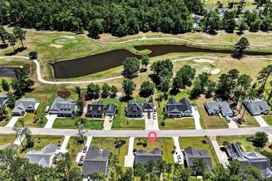 Experience refined Lowcountry living in Wedgefield Plantation at - photo 43