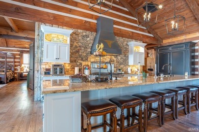 This one-of-a-kind custom log home, built in 2015, blends luxury - photo 12