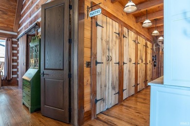 This one-of-a-kind custom log home, built in 2015, blends luxury - photo 13