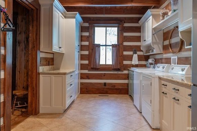 This one-of-a-kind custom log home, built in 2015, blends luxury - photo 21